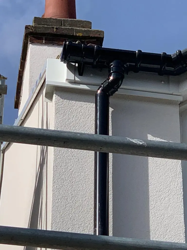 Shows guttering work with fascia and soffits